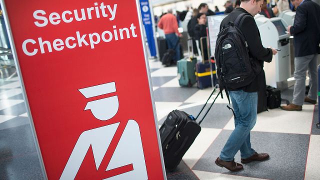 CHICAGO, IL - JUNE 02:  A sign directs travelers to a security checkpoint staffed by Transportation Security Administration (TSA) workers at O'Hare Airport on June 2, 2015 in Chicago, Illinois. The Department of Homeland Security said that the acting head of the TSA would be replaced following a report that airport screeners failed to detect explosives and weapons in nearly all of the tests that an undercover team conducted at airports around the country.  (Photo by Scott Olson/Getty Images)