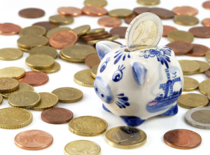 Piggy bank with euros and a typical Dutch pattern