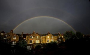 A double rainbow is seen above a row of terrace houses in Clapham, south London, Britain in this file photograph dated September 1, 2015.  REUTERS/Dylan Martinez/files