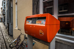 MAASTRICHT, NETHERLANDS - JANUARY 16, 2016: Orange mailbox postal service of the Netherlands.