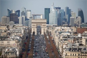General view of the skyline of La Defense business district with its Arche behind Paris' landmark, the Arc de Triomphe and the Champs Elysees Avenue in Paris, France, January 13, 2016.  REUTERS/Charles Platiau/File Photo