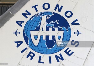 The logo for Antonov Airlines sits on the tailfin of an aircraft at the Antonov flight and test base near Kiev, Ukraine, on Thursday, May 19, 2011. The world's largest plane, capable of carrying 275 tons of cargo, has been grounded for seven years for improvements to correspond to international safety standards. Photographer: Andrey Rudakov/Bloomberg