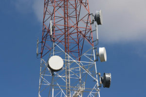 Telecommunication tower under blue sky