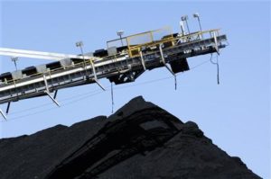 A stacker/reclaimer places coal in stockpiles after processing at Rio Tinto's Blair Athol Mine in Queensland in this undated handout photograph released April 28, 2010. REUTERS/RIO TINTO/Handout