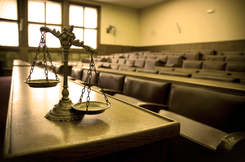 Symbol of law and justice in the empty courtroom, law and justice concept