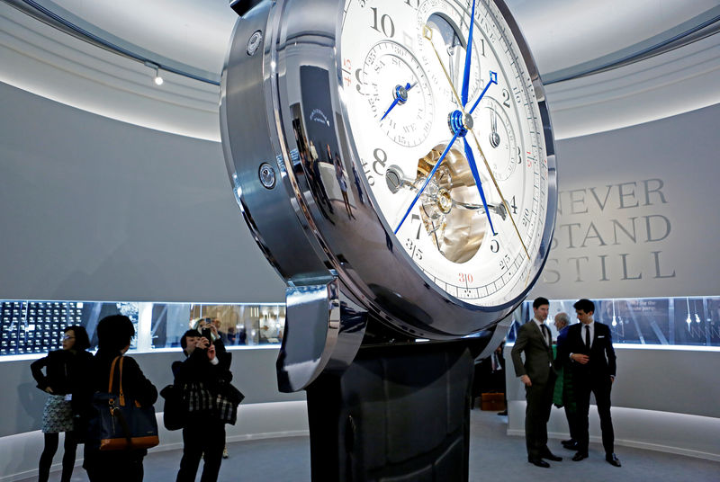 Visitors view the A. Lange & Soehne stand during the opening day of the Salon International de la Haute Horlogerie (SIHH) fair in Geneva, Switzerland January 16, 2017. REUTERS/Pierre Albouy