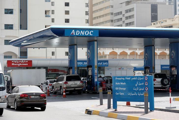Cars are seen an ADNOC petrol station in Abu Dhabi, United Arab Emirates July 10, 2017. REUTERS/Stringer