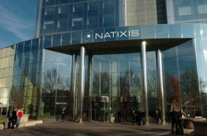 FRANCE - NOVEMBER 15:  Employees take a break outside the Natixis headquarters in Paris, France, on Thursday, Nov. 22, 2007. Natixis SA's bond-insurance unit, CIFG Guaranty, will be taken over by the French bank's controlling shareholders in a $1.5 billion rescue to preserve its top credit rating.  (Photo by Antoine Antoniol/Bloomberg via Getty Images)