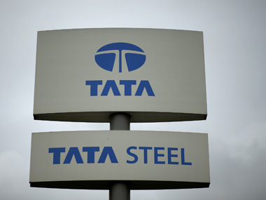 A Tata Steel sign is seen outside their plant in Scunthorpe northern England, October 15, 2014.  India's Tata Steel Ltd is in talks to sell loss-making European operations including mills in northern England and Scotland to Geneva-based Klesch Group, as it battles weak prices and tentative economic recovery. REUTERS/Phil Noble (BUSINESS INDUSTRIAL) - RTR4AAKC