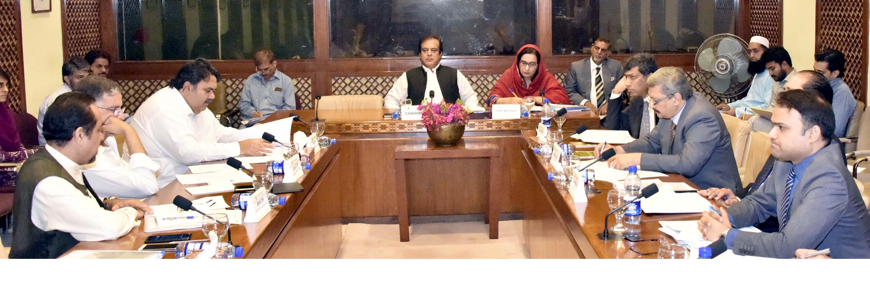 SENATOR SYED SHIBLI FARAZ, CHAIRMAN SENATE STANDING COMMITTEE ON COMMERCE AND TEXTILE INDUSTRY PRESIDING OVER A MEETING OF THE COMMITTEE AT PARLIAMENT HOUSE ISLAMABAD ON JULY 19, 2018.