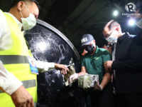 Bureau of Customs commissioner Isidro Lapeña and PDEA Director General Aaron Aquino extract the alleged shabu worth P3.4 billion inside steel cases during a press conference at the Manila International Container Port (MICP) in Port Area, Manila on August 7, 2018. Photo by Ben Nabong/Rappler