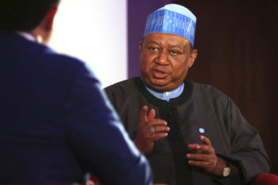 OPEC Secretary-General Mohammed Sanusi Barkindo speaks at an event in Fujairah, United Arab Emirates, Tuesday, Sept. 18, 2018. The head of OPEC said that the oil cartel must stick together for the good of the global economy amid Iran facing renewed U.S. sanctions. (AP Photo/Jon Gambrell)