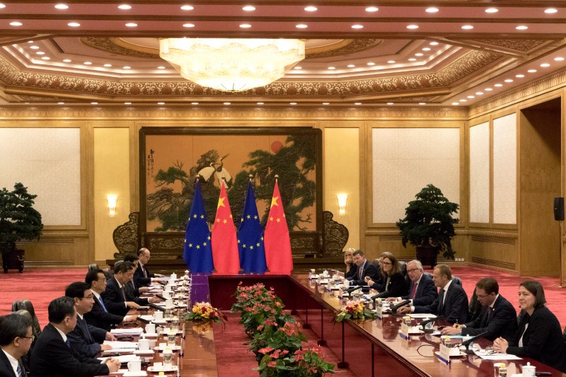 FILE PHOTO - European Council President Donald Tusk and European Commission President Jean-Claude Juncker meet with Chinese Premier Li Keqiang at the Great Hall of the People in Beijing, China, July 16, 2018. Ng Han Guan/Pool via REUTERS