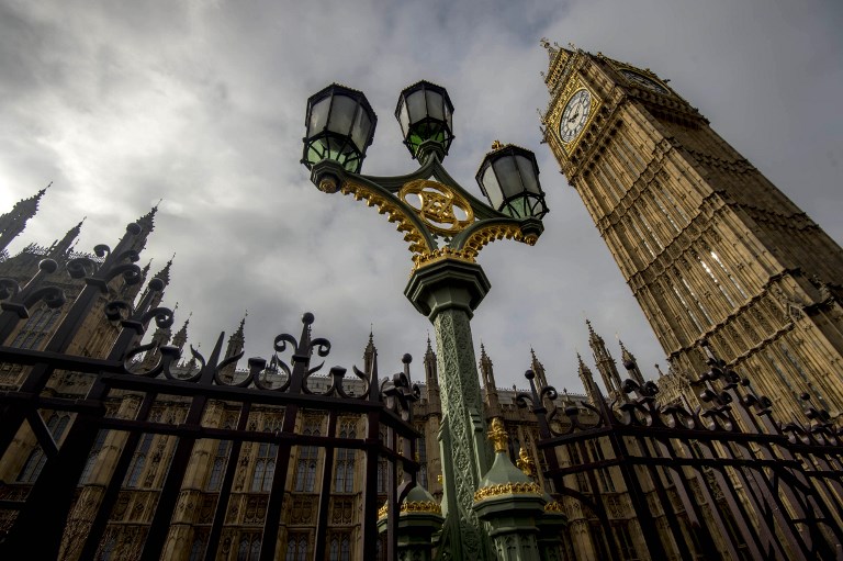 TO GO WITH AFP ELECTION STORY by  DENIS HIAULT
A general view of of the Palace of Westminster, with the Great Westminster Clock, more commonly known as "Big Ben" seen on April 5, 2015 in London. In one month, Britain votes in a general election likely to put the nail in the coffin of two party politics and herald an uncertain future of coalitions, alliances and horse-trading. Neither of the two parties which have dominated parliament since the 1920s, the Conservatives and Labour, are expected to win the 326 House of Commons seats out of 650 needed to govern alone. AFP PHOTO / NIKLAS HALLE'N / AFP PHOTO / NIKLAS HALLE'N