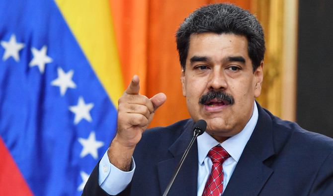 (FILES) In this file photo taken on January 25, 2019 Venezuelan President Nicolas Maduro offers a press conference in Caracas. Venezuelan President Nicolas Maduro pledged on January 28 to retaliate against the United States for its new sanctions on state oil company PDVSA. / AFP / Yuri CORTEZ