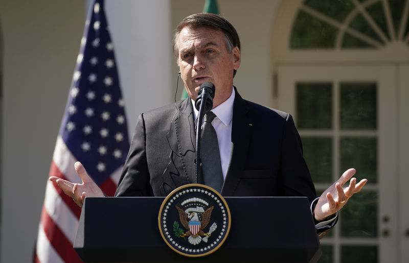 Brazil's President Jair Bolsonaro speaks during a joint news conference with U.S. President Donald Trump in the Rose Garden of the White House in Washington, U.S., March 19, 2019. REUTERS/Kevin Lamarque