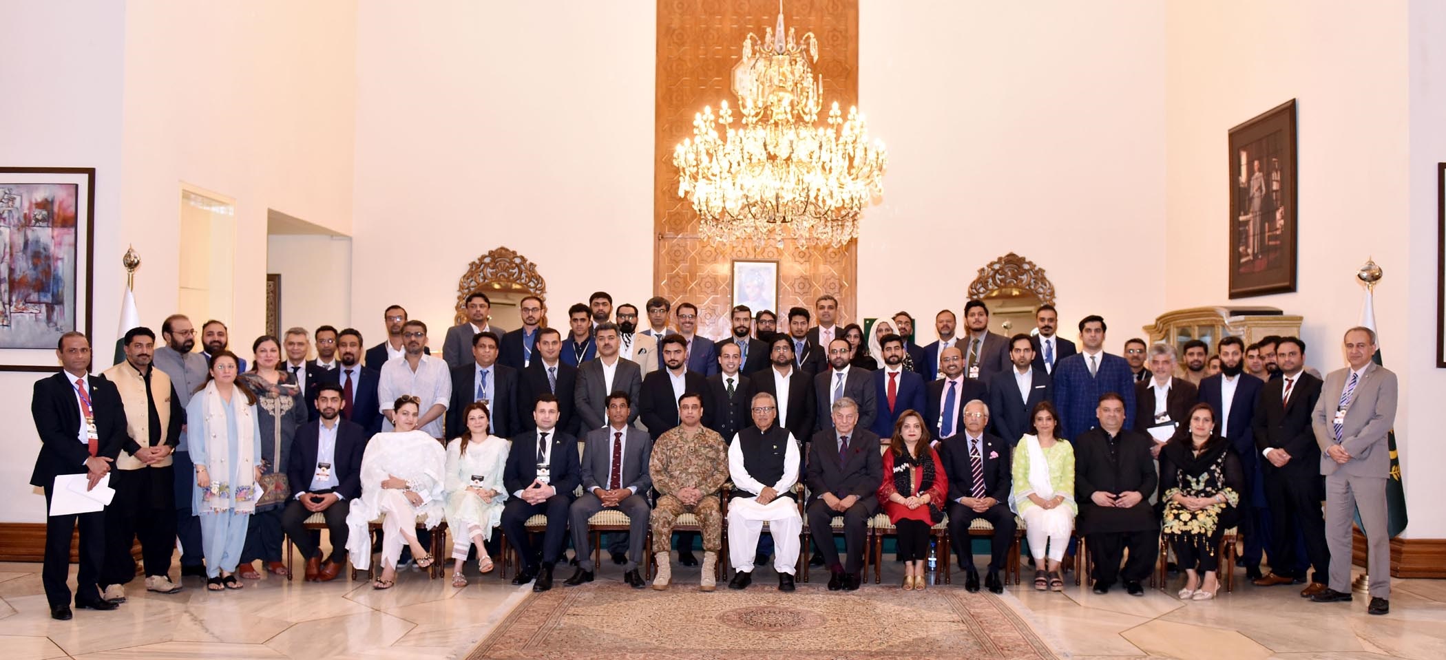 PRESIDENT DR. ARIF ALVI IN A GROUP PHOTO WITH A DELEGATION OF INTERNATIONAL CPEC WORKSHOP ORGANIZED BY NDU AT AIWAN-E-SADR, ISLAMABAD ON APRIL 18, 2019.