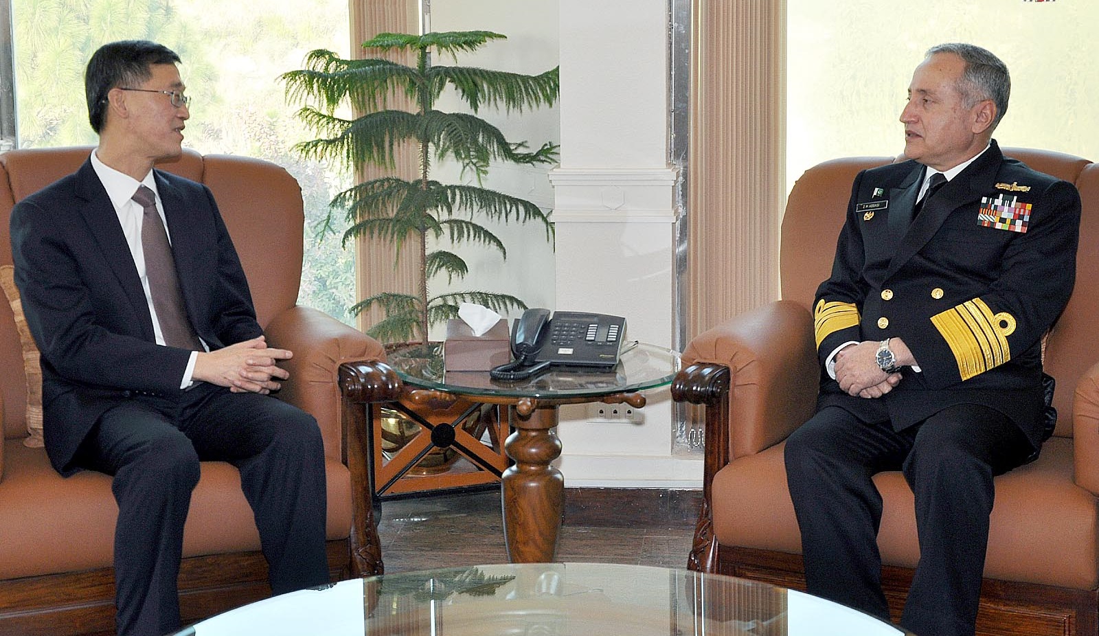ISLAMABAD: Chief of Naval Staff (CNS) Admiral Zafar Mahmood Abbasi exchanging view is with Ambassador of China to Pakistan, Yao Jing at Naval headquarter .INP PHOTO