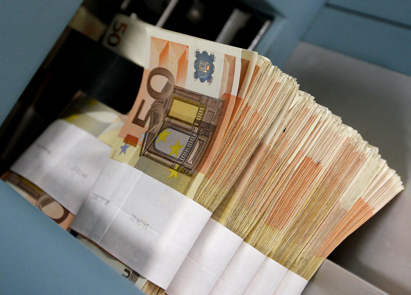 FILE PHOTO: Fifty-euro notes are seen at the Belgian Central Bank in Brussels in this December 8, 2011 file photo. REUTERS/Yves Herman