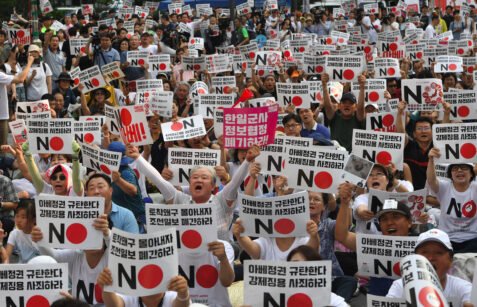 Protesters hold up placards reading "No (Japan)" during a rally against Japan's decision to remove South Korea from a so-called "white list" of favoured export partners, near the Japanese embassy in Seoul on August 3, 2019. - Japan and South Korea rescinded each other's favoured export partner status on August 2, and Seoul said it would review a military information agreement, as a long-running row between the US allies hit a new low. (Photo by Jung Yeon-je / AFP)