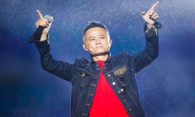 (FILES) This file photo taken on October 11, 2017 shows Jack Ma, Alibaba Group founder and executive chairman, gesturing during the Music Festival of the Computing Conference 2017 in Hangzhou in China's eastern Zhejiang province. - Jack Ma steps aside on September 10, 2019 as chairman of Alibaba, ending a spectacularly successful 20-year run during which the charismatic former English teacher's e-commerce company left a profound impact on China's economy. (Photo by STR / AFP) / China OUT