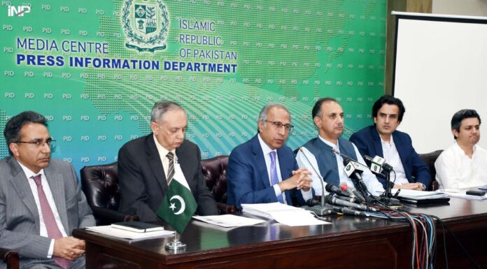 ISLAMABAD: Advisor to PM on Finance, Abdul Hafeez Sheikh addressing a Press Conference  along with Minister for Energy Omar Ayub Khan Minister for Planning and Development Makhdoom Khusro Bukhtiyar and Advisor to PM on Commerce,  Abdul Razzaq Dawood  . INP