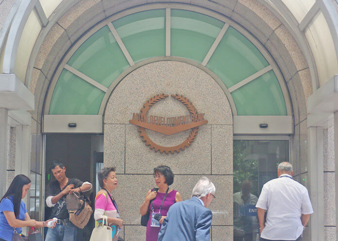 People are seen going inside the ADB building in Ortigas, report said The Asian Development Bank expects to lend an estimated $7.8 billion, or nearly $2 billion annually, from 2018 to 2021, under a new six-year country partnership strategy.It would be the highest for any 4-year period, the Manila-based multilateral lender said Thursday.“The annual average also doubles the current estimated yearly lending pipeline,” the bank said in a statement.Photo by:Nonie Reyes