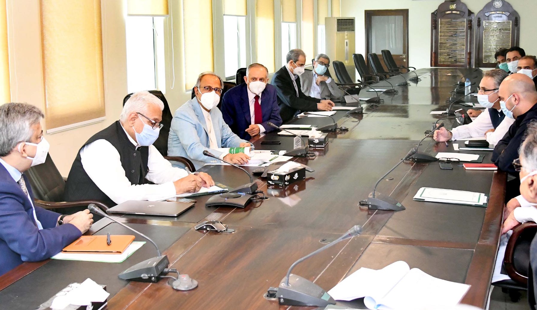 Adviser to the Prime Minister on Finance and Revenue, Dr. Abdul Hafeez Shaikh chairing a meeting to review the situation, availability and future demand of wheat and flour in the Khyber Pakhtunkhwa province in Islamabad on August 17, 2020.