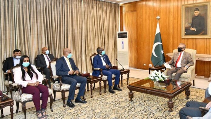 A PARLIAMENTARY DELEGATION OF DJIBOUTI, LED BY THE PRESIDENT OF DJIBOUTI NATIONAL PARLIAMENT, MR. MOHAMED ALI HOUMED, MEETING PRESIDENT DR. ARIF ALVI, AT AIWAN-E-SADR, ISLAMABAD ON DECEMBER 30, 2020.