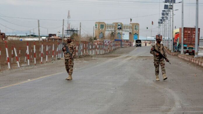 CHAMAN, PAKISTAN - FEBRUARY 18: Pakistani soldiers patrol at the Chaman border crossing point in the southwestern border town of Chaman, Pakistan on February 18, 2017. Pakistan has closed two of its border crossings to Afghanistan, Torkham in the north and Chaman in the south and demanded Kabul to take action against 76 "terrorists" that are claimed to be hiding in Afghan territories in response to the worst attack on Pakistani soil since 2014. The government of Pakistan took the move following a suicide bombing at a Muslim sufi shrine in the town of Sehwan, in southern Sindh province on Thursday, killing 88 people and wounding hundreds others. (Photo by Naveed Khan/Anadolu Agency/Getty Images)