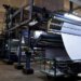 In this photograph taken on November 16, 2016, Pakistani workers operate a machine at a textile factory in Faisalabad.
As Pakistan slowly emerges from a long-term power crisis, its once booming textile sector is scrambling to find its feet -- but high energy costs and a decade lost to competitors mean recovery is far from assured. Energy production was severely depressed for more than 10 years due to chronic under-investment, inefficiencies in the power network and an inability to collect sufficient revenue to cover costs.
 / AFP PHOTO / KHALIL UR-REHMAN / TO GO WITH AFP STORY: Pakistan-Energy-Industry-Textiles, FOCUS by Caroline Nelly PERROT