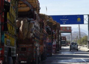 Laden Pakistani trucks are seen near Torkham, close to the Pakistan-Afghanistan border, on April 14, 2017, a day after the US military dropped a largest non-nuclear bomb on an Islamic State complex in Afghanistan.


Trade in and out of Afghanistan from Pakistan appeared to be flowing as normal, however, with traffic at the Torkham border crossing apparently undisturbed,  despite the historic detonation roughly 50 kilometres away. / AFP PHOTO / ABDUL MAJEED        (Photo credit should read ABDUL MAJEED/AFP via Getty Images)