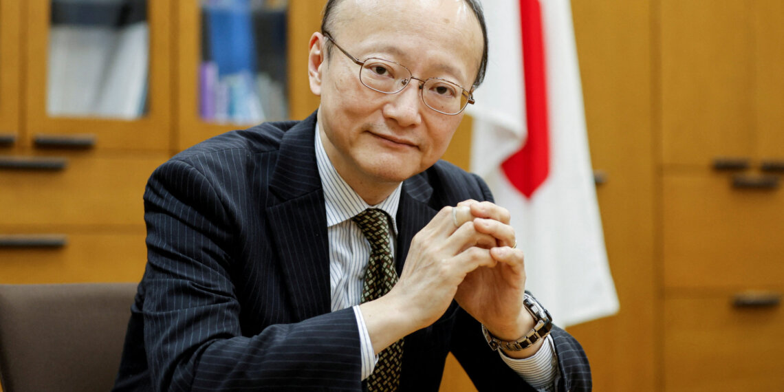 FILE PHOTO: Japan's vice minister of finance for international affairs, Masato Kanda, poses for a photograph during an interview with Reuters at the Finance Ministry in Tokyo, Japan January 31, 2022. Picture taken January 31, 2022. REUTERS/Issei Kato