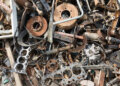 Old rusty corroded car parts in car scrapyard. Car recycling.Wrecking Machinery Parts wait for reused or to be a part for repair.